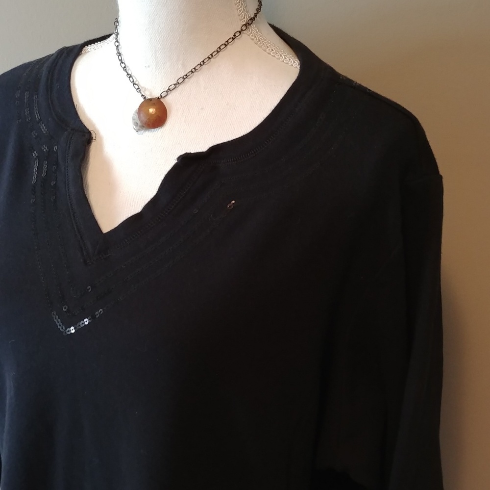 Quaker Factory sequin trimmed split v neck top.